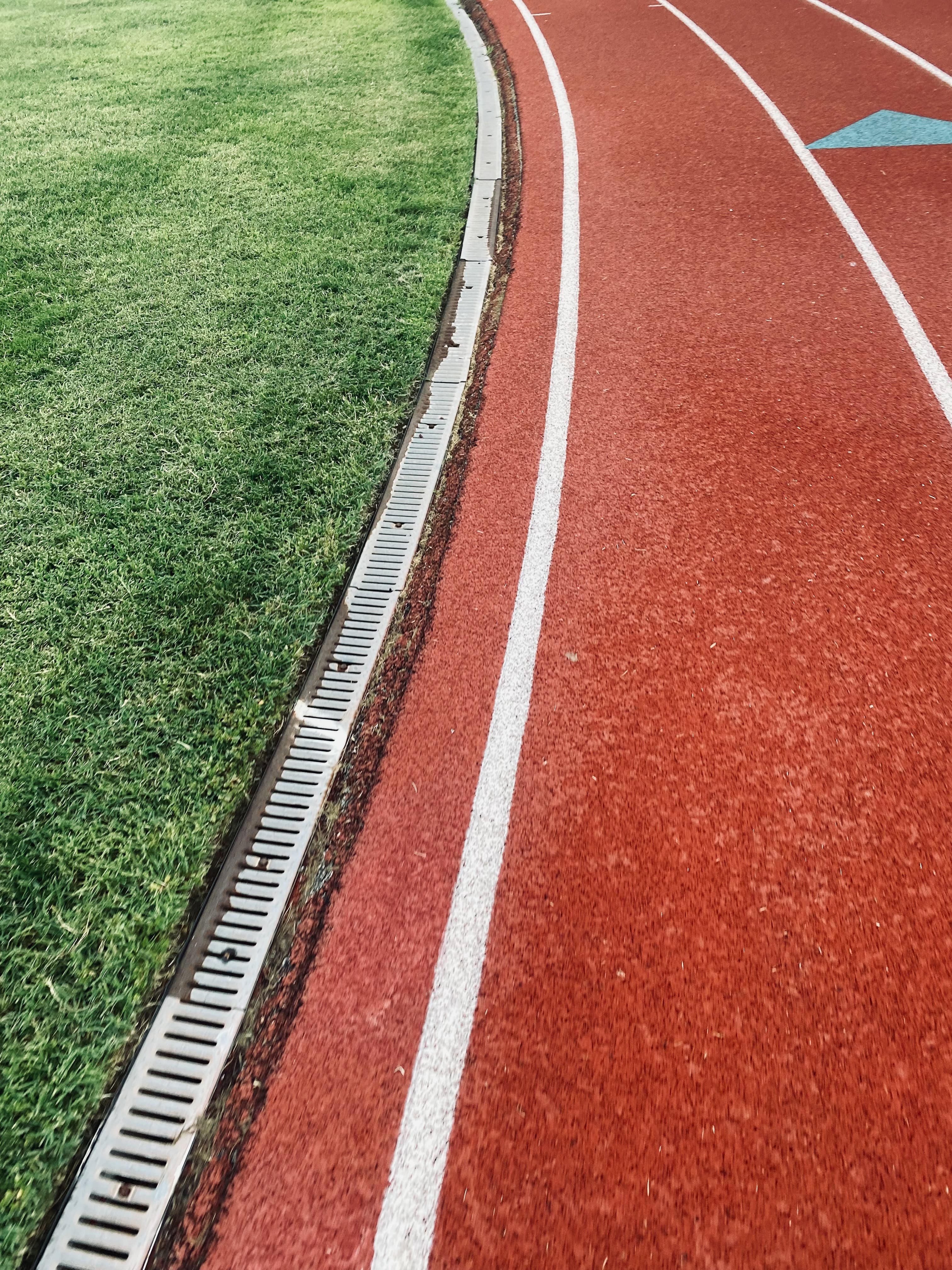 Runners on an outdoor track